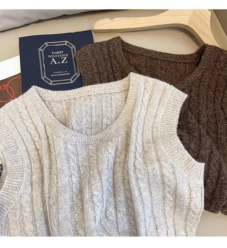 Trendy women’s clothing with a modern twist   Solid Color Twist Sleeveless Knitted Vest Women's New Style Sweater Vest Trendy      S5033