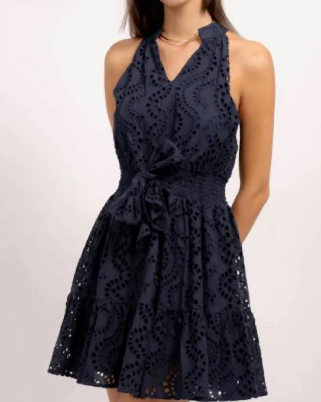 Get noticed with eye-catching women’s fashion   Liam Eyelet Dress In Navy